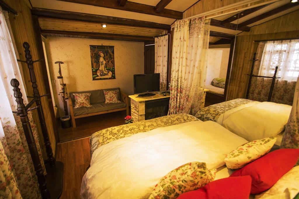 Hotel Secret Garden Lijiang  Zimmer foto